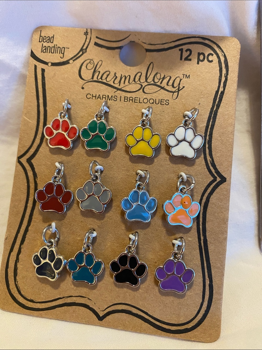 Charmalong Charms - dragonflies, paw prints and zodiac signs . Total 36 charms.
